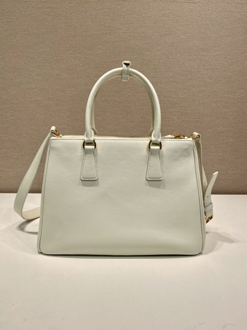 Pra*a top handle bags
